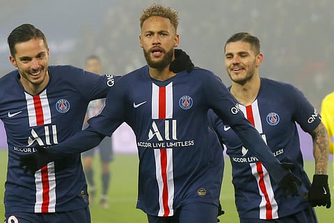 PSG's Neymar, center, celebrates with PSG's Pablo Sarabia, left and PSG's Mauro Icardi after scoring his side's second goal during the French League One soccer match between PSG and Nantes at the Parc des Princes stadium in Paris, Wednesday, Dec. 4, 2019.
