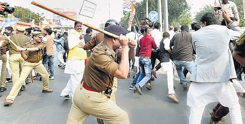Police use batons to disperse Congress workers who were staging a protest in front of the UP BJP headquarters in Lucknow on Saturday over the Unnao rape case | PTI