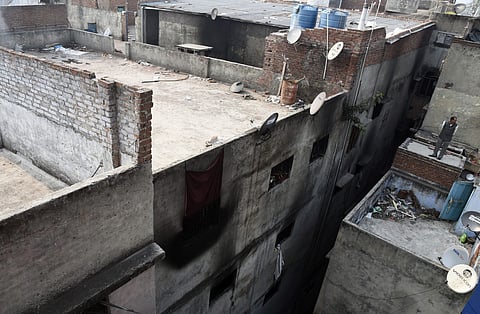A view of the backside of the factory which caught fire at Rani Jhansi Road in New Delhi on Sunday. (Photo | Parveen Negi/EPS)