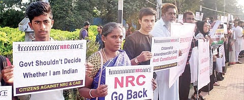 People staging a silent protest against NRC and Citizenship Amendment Bill at Tank Bund in Hyderabad on Sunday | Sathya keerthi