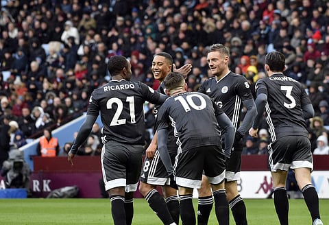 Leicester's Jamie Vardy celebrates with teammates after scoring his side's opening goal against Aston Villa. (Photo | AP)
