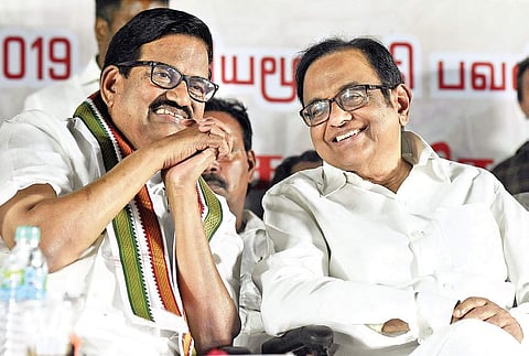 Ex Finance Minister P Chidambaram shares his words with KS Alzhagiri at the welcome meet oraganised by Tamil Nadu Congress Committee at its party head quarters in Chennai on Saturday. (Photo| EPS/Ashwin prasath)