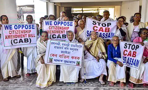 Elderly women from an old-age home take part in a protest against Citizenship Amendent Bill in Guwahati Monday. (Photo | PTI)