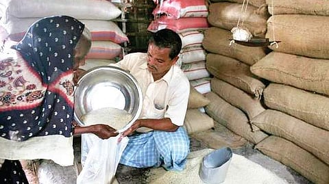 A ration card holder at a ration shop