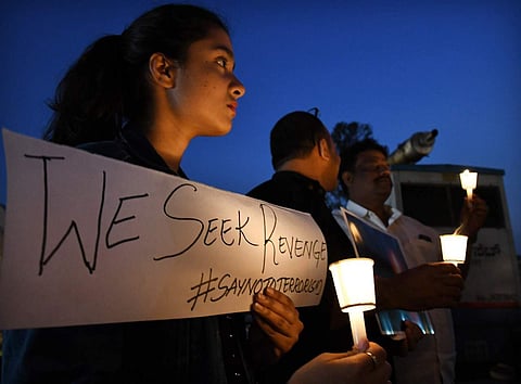 People pay candle light homage to CRPF jawans killed in Pulwama terrorist attack. (Pushkar V | EPS)