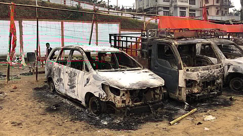 Around 20 vehicles were also torched at the Dorjee Khandu Convention Centre (Photo | EPS)
