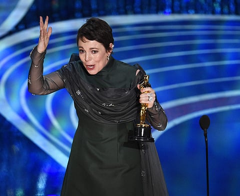 Olivia Colman reacts as she accepts the award for best performance by an actress in a leading role for 'The Favourite' at the Oscars. (Photo | AP)