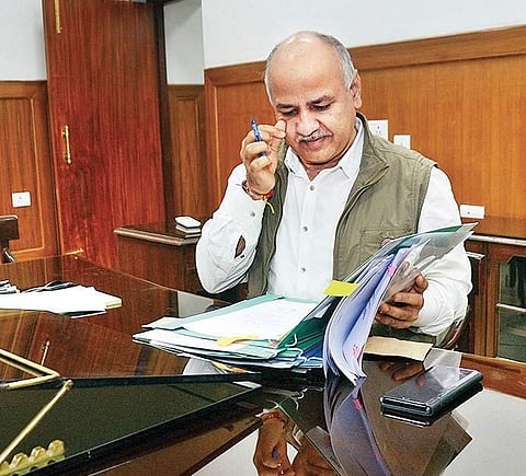 Deputy Chief Minister Manish Sisodia adding final touches to the annual budget at the Delhi Legislative Assembly in New Delhi on Monday | Naveen Kumar