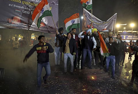 People shout slogans as they celebrate reports of Indian aircrafts bombing Pakistan territory, in New Delhi, India, Tuesday, Feb. 26, 2019. | AP