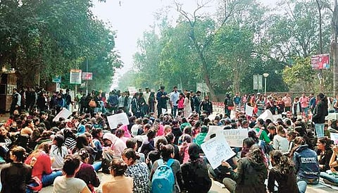 The protesters agitated outside the Arts faculty on Monday | express