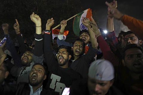 shout slogans as they celebrate reports of Indian aircrafts bombing Pakistan territory, in New Delhi, India, Tuesday, Feb. 26, 2019. | AP