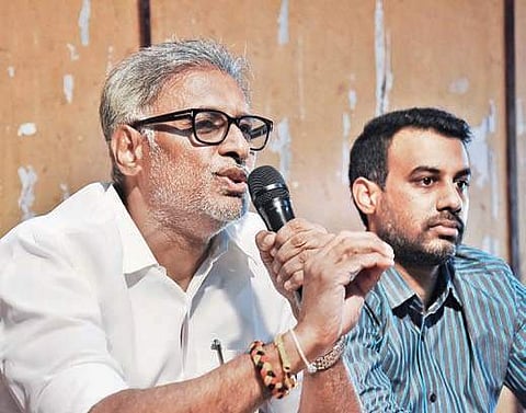 D Venkateswara Rao and Hitesh in Vijayawada on Tuesday I P Ravindra Babu