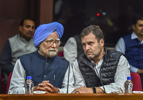 Former prime minister Manmohan Singh and Congress president Rahul Gandhi during Opposition parties' meeting to discuss the Common Minimum Programme CMP and chalk out future strategy for the Lok Sabha polls at Parliament House complex in New Delhi Wednesda