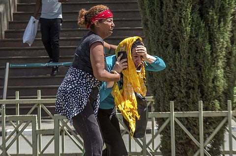 Family members of the victims involved in a plane crash react at Addis Ababa international airport. (Photo | AP