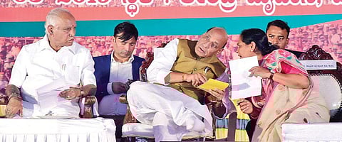 BJP state president B S Yeddyurappa, Union Home Minister Rajnath Singh and MP Shobha Karandlaje at a convention of BJP Shakti Kendra office-bearers in Mangaluru on Saturday | rajesh Shetty Ballalbagh
