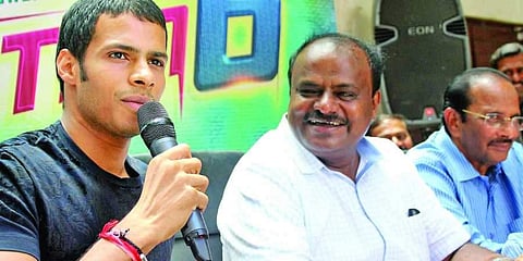 JD(S) leader HD Kumaraswamy with his son Nikhil Gowda (File Photo | EPS)