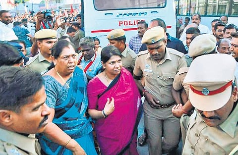 DMK MP Kanimozhi being arrested during a protest in Pollachi on Tuesday | express