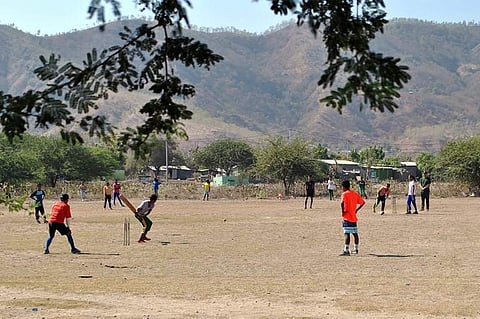 Local youth playing cricket in East Timor | AFP