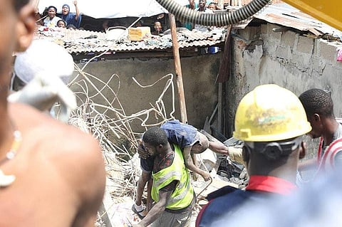 Police said they believed scores of people were trapped under the rubble of the building which collapsed mid-morning in an area near Itafaji market on Lagos Island. (Photo: Twitter)