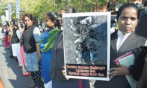 Members of Women’s Advocates Association of Madras High Court stage a protest demanding strict action against accused in Pollachi sex abuse case, in Chennai on Wednesday | Ashwin Prasath