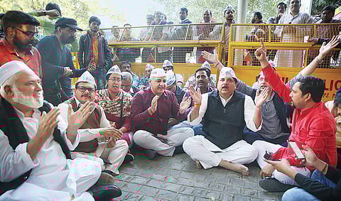 Deputy Chief Minister Manish Sisodia, AAP leader and Rajya Sabha MP Sanjay Singh, and others stage a protest on Friday at Nirvachan Sadan in New Delhi against alleged police raids on call centres hired by the party | Shekhar Yadav