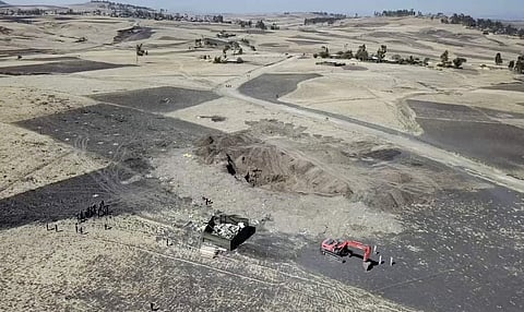 This aerial image made from video shows recovery work continuing at the scene where the Ethiopian Airlines Boeing 737 Max 8 crashed shortly after takeoff on Sunday killing all 157 on board. (Photo | AP)