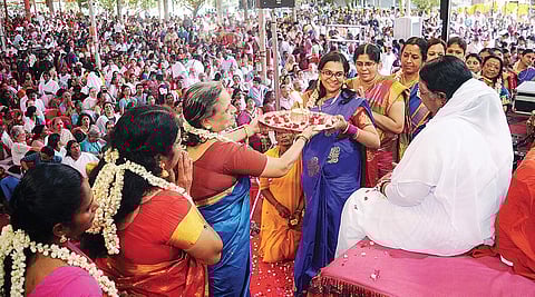 Devotees offering ‘aarthi’ to Mata Amritanandamayi during Brahmasthanam Mahotsavam, which kicked off at Edappally in Kochi on Sunday | A Sanesh