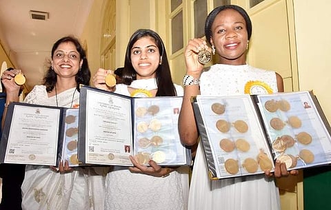 (Right to left) Emelife Stella Chinelo, Sanjana Darla P and Meera Manahar Rao Anasane with their gold medals (Photo | EPS)