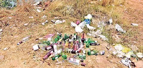 The area behind Sulthan Bathery which is littered with liquor, bottles and garbage | Rajesh Shetty Ballalbagh