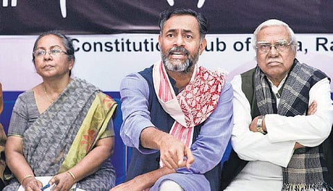 Activist and founder Swaraj Abhiyan Yogendra Yadav with social activist Annie Namala and General Secretary of All India Kisan Sabha Hannan Mollah at a media interaction in New Delhi on Monday | Naveen Kumar