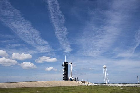 The SpaceX Falcon 9 rocket with the unmanned Crew Dragon capsule on its nose sits at Pad 39A (C) at the Kennedy Space Center in Florida. (Photo | AFP)
