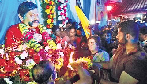 Actress Sumalatha and son Abhishek inaugurate the bust of Ambareesh in Dodda Arasinakere, Mandya, on Friday | EXPRESS