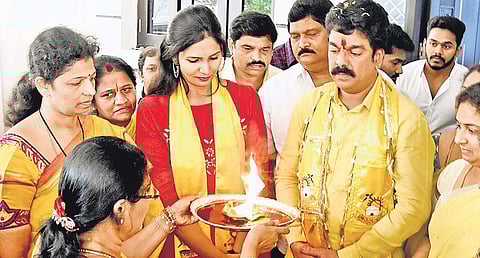 Bonda Umamaheswara Rao being offered Harathi by his wife in Vijayawada on Wednesday before filing his nomination papers I P Ravindra Babu