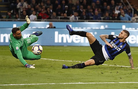 Inter Milan's Mauro Icardi tries to score over AC Milan goalkeeper Gianluigi Donnarumma during a Serie A derby (File Photo | AP)