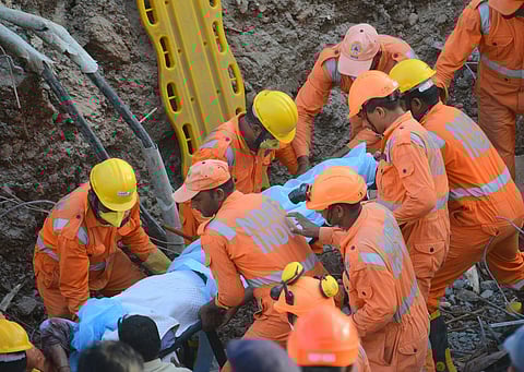 Rescue operations at Dharwad building collapse site. (Photo | EPS)