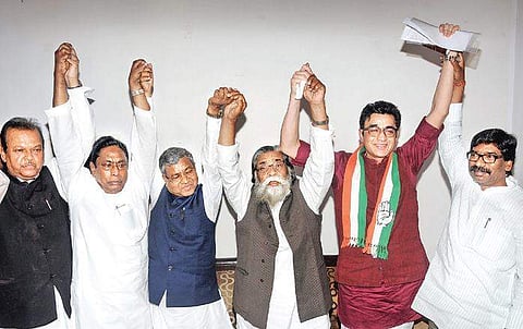 Former Jharkhand CM Shibu Soren (centre) along with other alliance partners at his Ranchi residence on Sunday. | PTI