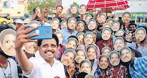 CPM candidate Su Venkatesan clicking a selfie with his supporters during an election campaign in Madurai | k k sundar