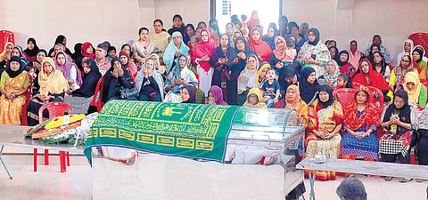 Family and relatives offering prayers as Ansi’s mortal remains are kept for public to pay homage in Kodungallur on Monday.