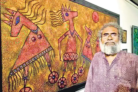 Artist TA Satyapal with his art work