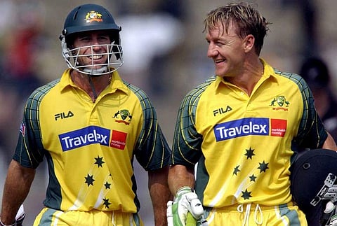 Australian batsman Michael Bevan (L) and his teammate Andy Bichel (R)| AFP