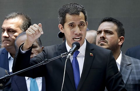 Opposition leader Juan Guaido, self-proclaimed interim president of Venezuela, talks during a meeting calling for more protests, in Caracas, Venezuela. (Photo | AP)
