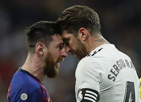 Lionel Messi and Sergio Ramos locked heads after Ramos flung an arm into Messi's face | AP