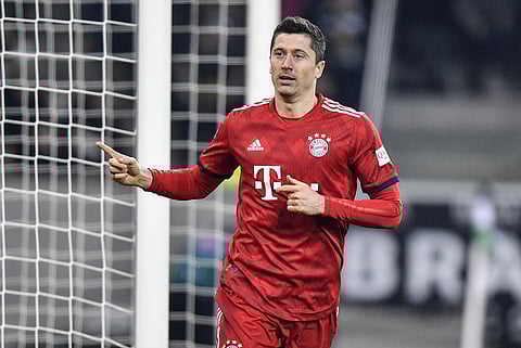 Bayern's 11th win in 12 league games means only goal difference separates them and Dortmund | AP