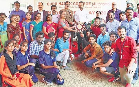 Cricketer and alumnus of Guru Nanak college, Arun Karthik, with winners and staff during the sports day celebrations at the college | Nakshatra Krishna-moorthy.