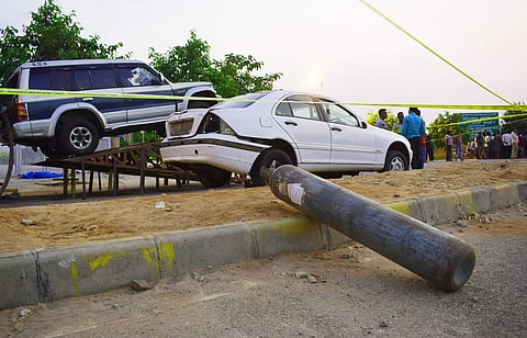 The exploded cylinder at the accident spot, in Bengaluru on Friday; (below) Actor Chetan Kumar arrives at the spot. | Pandarinath B