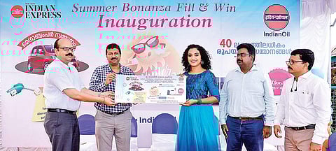 Actor Marina Michael Kurisingal receiving the first Summer Bonanza Fill-and-Win coupon from IOC Deputy General Manager (Retail Sales) K Raghu and The New Indian Express General Manager P Vishnu Kumar in Kochi on Friday.| Arun Angela