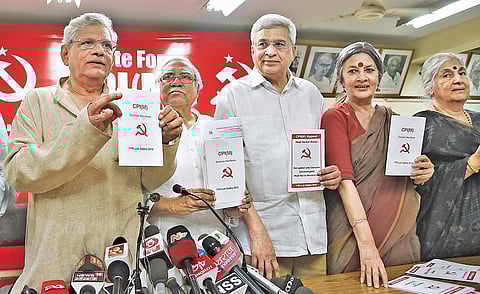 CPI(M) General Secretary Sitaram Yechury, former general secretary Prakash Karat and other leaders release the party’s manifesto for the upcoming Lok Sabha elections at a press conference, in New Delhi on Thursday (Photo | Parveen Negi/EPS)