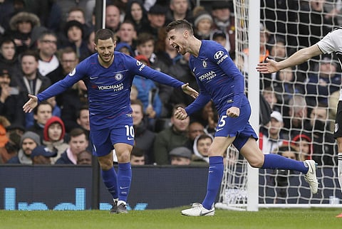 Chelsea's Jorginho, center, celebrates with his teammate Eden Hazard after scoring his side's second goal during the English Premier League soccer match between Fulham and Chelsea at Craven Cottage stadium in London. (Photo | AP)