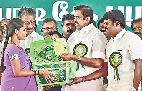 Chief Minister Edappadi K Palaniswami distributing ‘Amma Maternal Nutrition Kit’ to a woman in the city on Monday