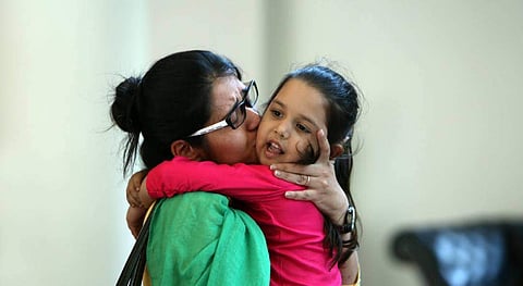 Uzma Ahmed is reunited with her daughter on Thursday, May 25 after her ordeal in Pakistan.